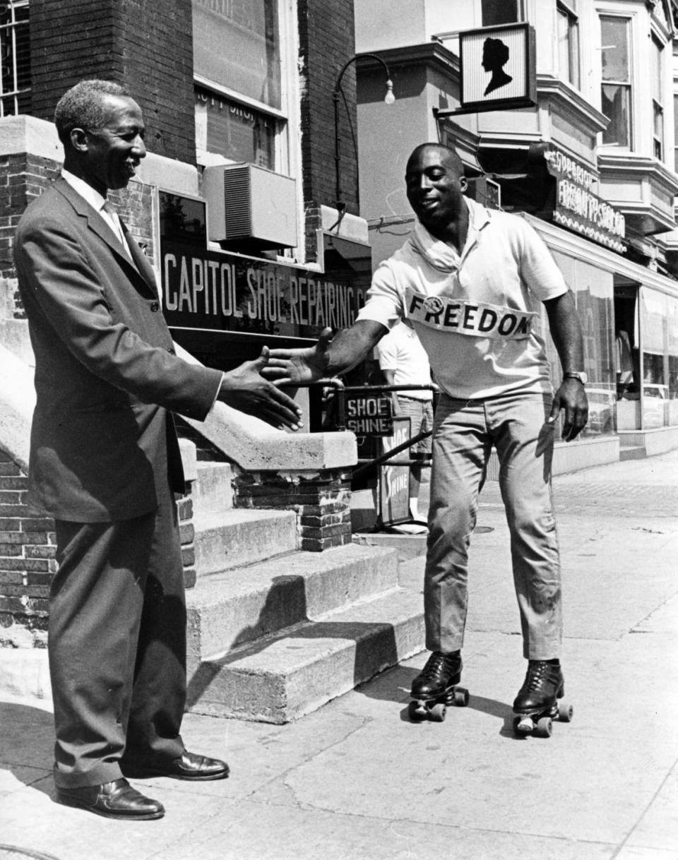 <div class="inline-image__caption"><p>Ledger Smith, a semi-professional skater, is greeted by H. Carl Moultie, vice president of the D. C. branch of the NAACP, as he arrived by roller skates from Chicago to join the March on Washington, he is seen here in Washington, DC on August 27, 1963. Ledger left on August 17 and averaged between 70 and 80 miles a day.</p></div> <div class="inline-image__credit">Tom Kelley / The Washington Post via Getty</div>