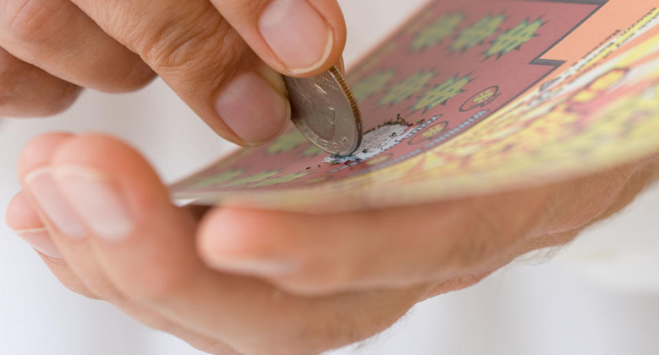 A Morayfield man said he and his wife decided to mow the lawn after learning they had won $250,000 from their $10 scratchie. Source: Getty Images (file pic)