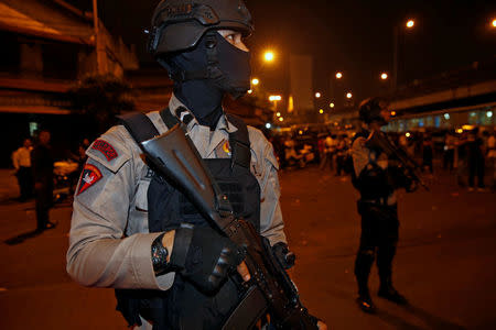 Police guard at a scene of an explosion in Jakarta, Indonesia May 24, 2017. REUTERS/Darren Whiteside