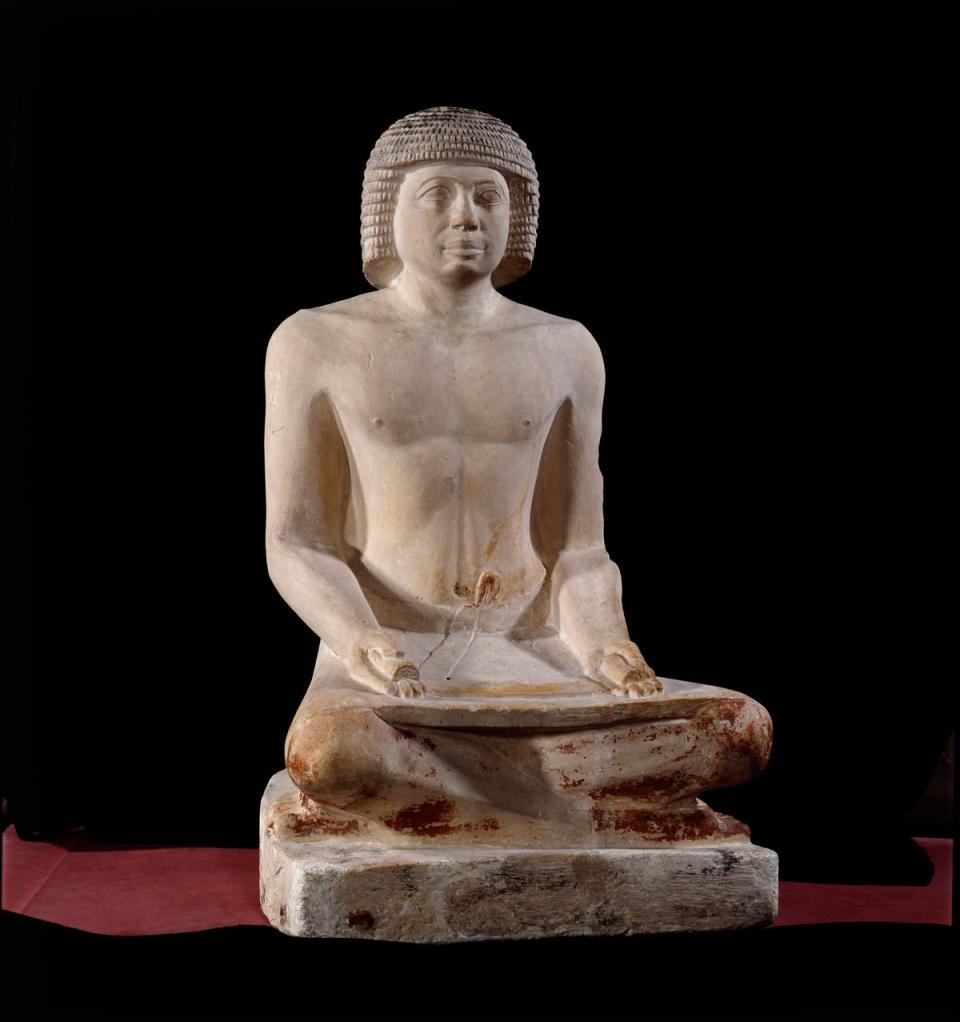 Statue of ascribe (Muséedu Louvre/PA)