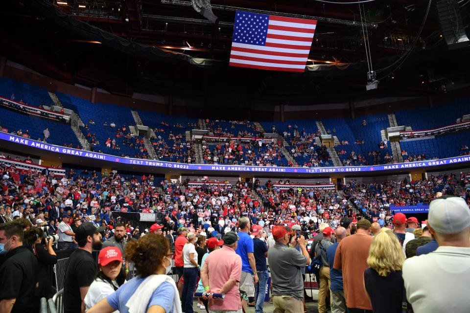 The upper section of the arena is seen partially empty as US President Donald Trump speaks during a campaign rally at the BOK Center on June 20, 2020 in Tulsa, Oklahoma. - Hundreds of supporters lined up early for Donald Trump's first political rally in months, saying the risk of contracting COVID-19 in a big, packed arena would not keep them from hearing the president's campaign message. (Photo by Nicholas Kamm / AFP) (Photo by NICHOLAS KAMM/AFP via Getty Images)