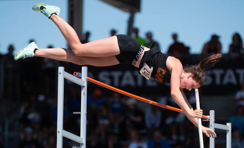 Capital&#x002019;s Hana Moll goes up and over the bar en route to a a state title and new meet record of 14&#x002019; 7&#x00201d; during the second day of the WIAA state track and field championships at Mount Tahoma High School in Tacoma, Washington, on Friday, May 26, 2023.