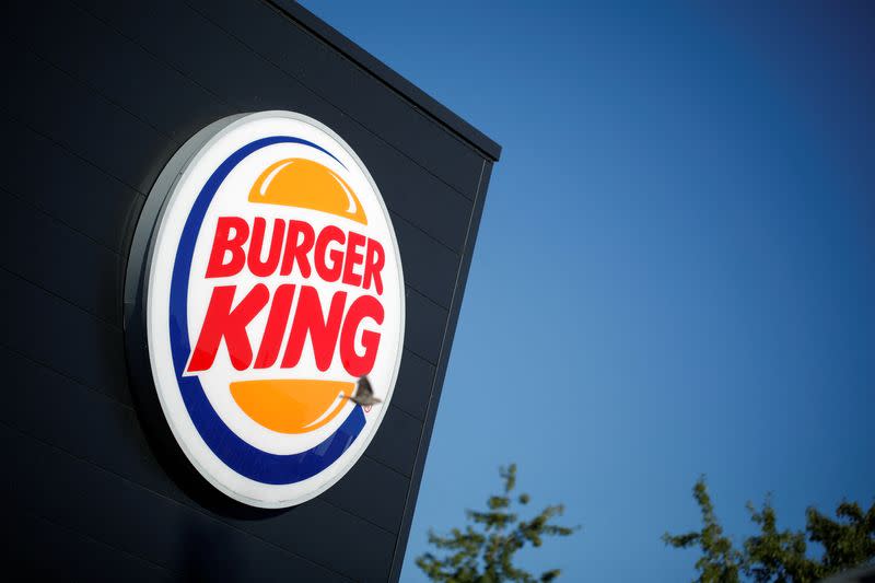 FILE PHOTO: The Burger King company logo stands on a sign outside a restaurant in Bretigny-sur-Orge, near Paris