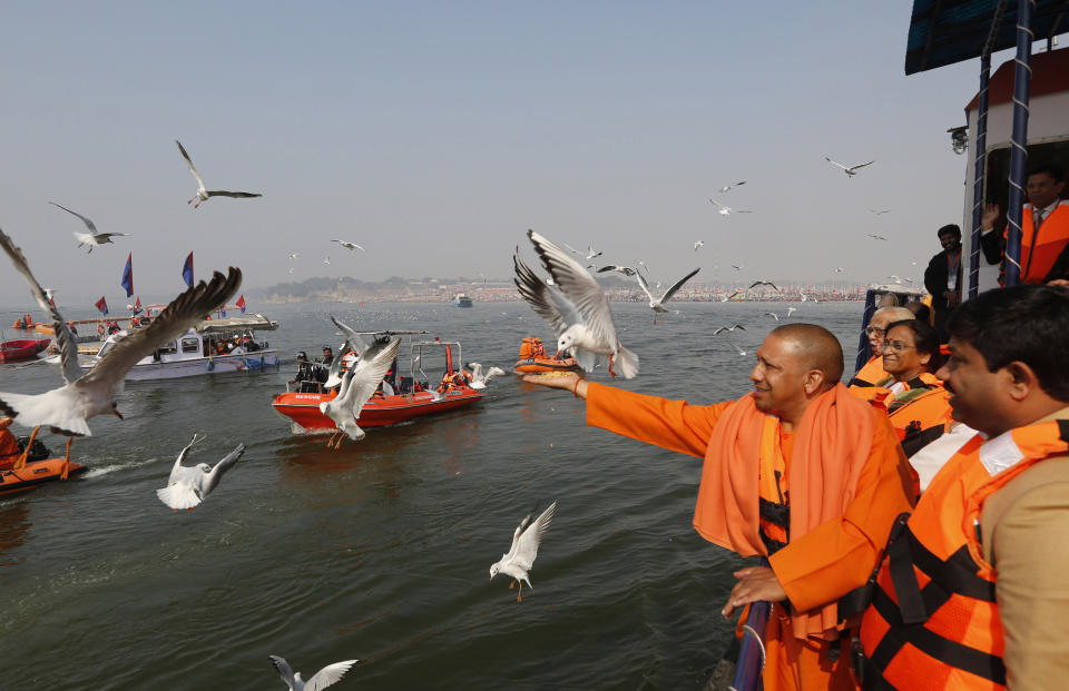 <p>Chief Minister Yogi Adityanth and Governor of Uttar Pradesh Shri Ram Naik,feeds Siberian Gulls on the banks of the River Ganges rivers Ganga, Yamuna and the mythical river Saraswati at Prayagraj Uttar Pradesh state, India, Thursday, Jan.17, 2019. The Kumbh Mela is a series of ritual baths by Hindu holy men, and other pilgrims at the confluence of three sacred rivers and the Yamuna, the Ganges and the mythical Saraswati â that dates back to at least medieval times. The city’s Mughal-era name Allahabad was recently changed to Prayagraj. (AP Photo/Rajesh Kumar Singh) </p>