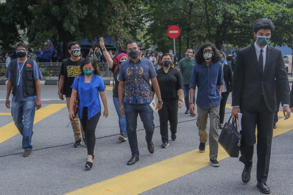 #Lawan rally participants arrive to give their statements at the Dang Wangi district police headquarters in Kuala Lumpur August 2, 2021. — Picture by Yusof Mat Isa