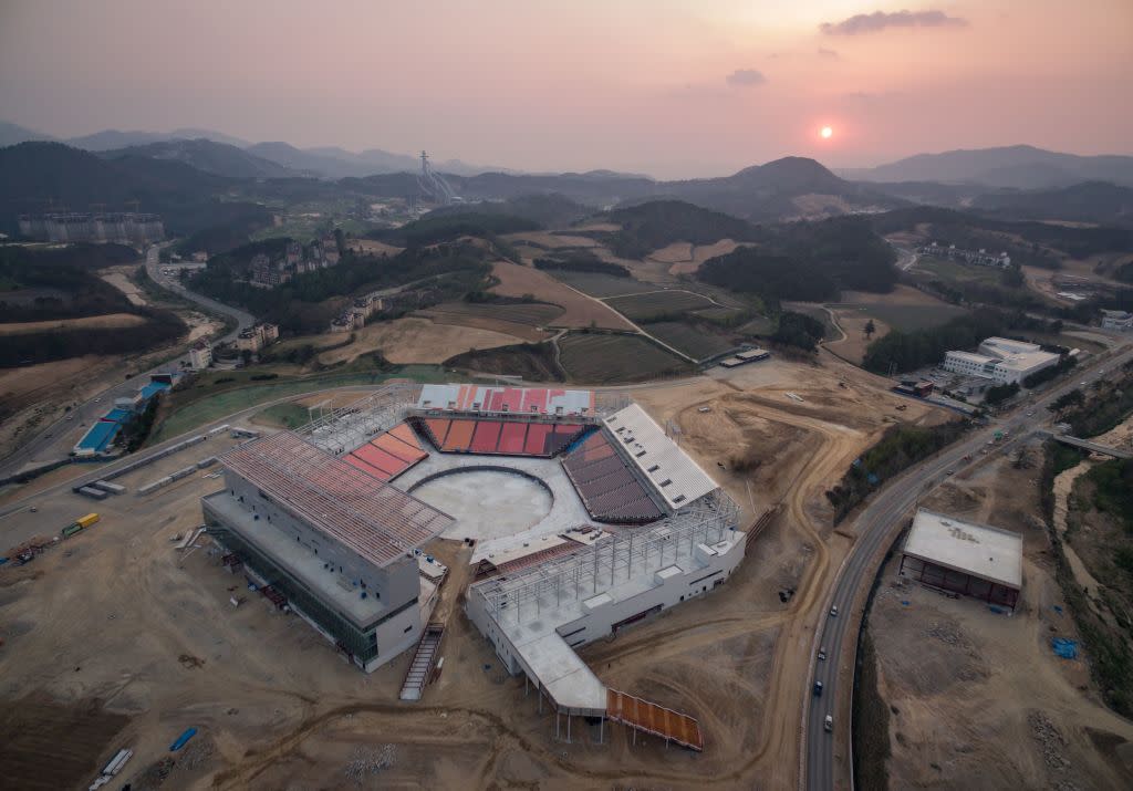 PyeongChang Stadium, seen here under construction, will be ready for Friday’s chilly Opening Ceremony. (Getty)