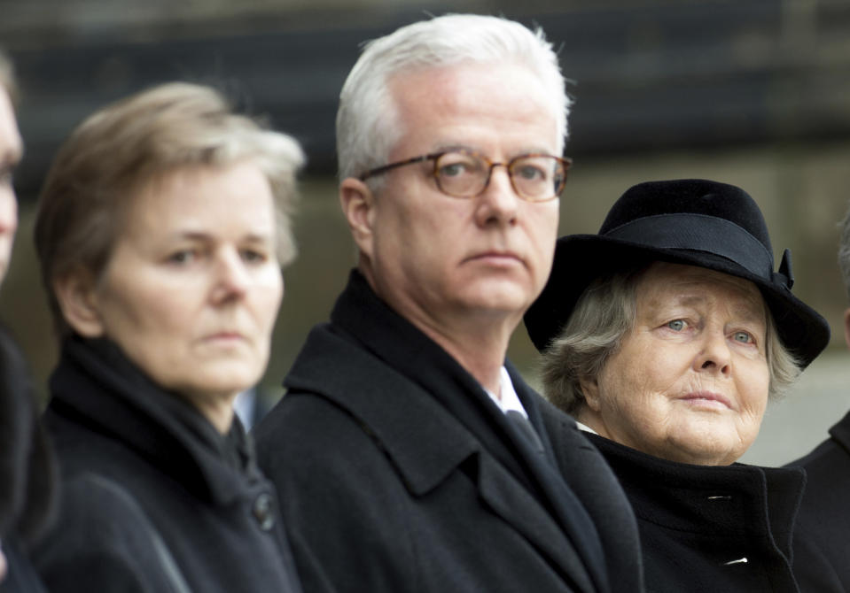 FILE -- In this Feb. 11, 2015 photo, from left, the children Beatrice von Weizsäcker and Fritz von Weizsaecker and the wife Marianne von Weizsaecker attend the funeral for the former German President Richard von Weizsaecker in Berlin, Germany. Fritz von Weizsaecker has been killed on Tuesday, Nov. 19, 2019 while he was giving a lecture at a hospital in Berlin where he also worked as a physician. (Maurizio Gambarini/dpa via AP, file)