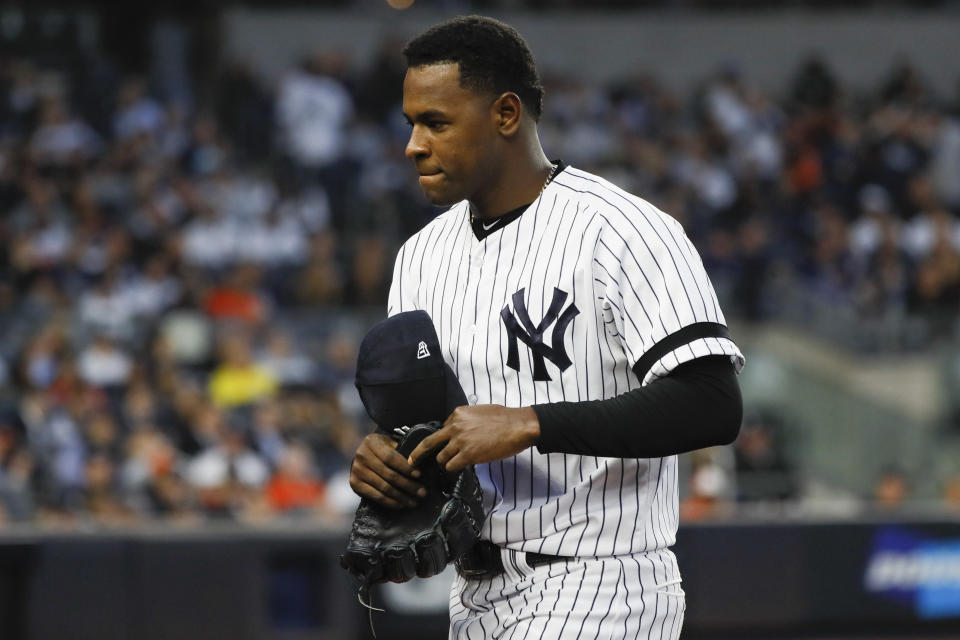 FILE - In this Oct. 15, 2019, file photo, New York Yankees starting pitcher Luis Severino leaves the game against the Houston Astros during the fifth inning in Game 3 of baseball's American League Championship Series in New York. Severino needs Tommy John surgery and will miss the 2020 season, another setback for the two-time All-Star and the rotation of the AL East favorites. “His plan is to have it done as soon as possible,” Yankees general manager Brian Cashman said Tuesday, Feb. 25, 2020. (AP Photo/Matt Slocum, File)