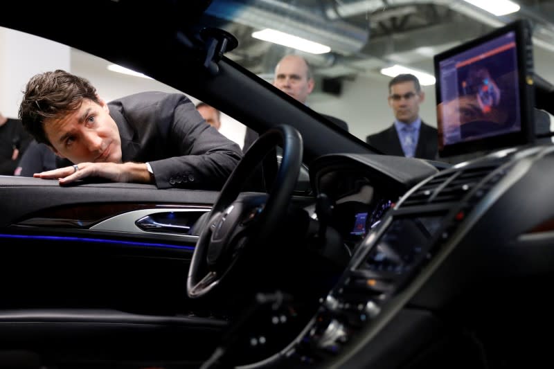 Canada's Prime Minister Justin Trudeau takes part in a tour at the BlackBerry QNX facility in Ottawa, Canada December 19, 2016. REUTERS/Blair Gable