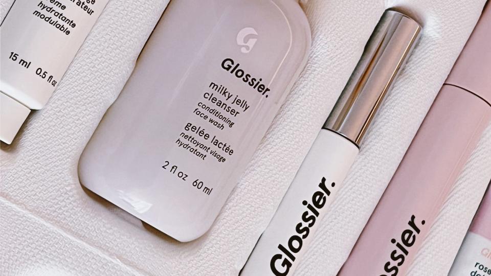 Glossier's The Essential Edit contains both full-size and mini skincare and makeup items.