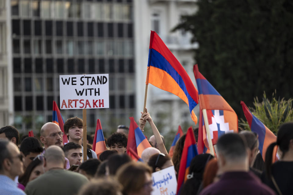 Protesters take part in a rally after Azerbaijan reclaimed control of the separatist region of Nagorno-Karabakh in a blitz offensive, and forced tens of thousands of ethnic Armenians flooded over its borders, in Athens, Greece, Sunday, Oct. 1, 2023. Hundreds of Armenians who live in Greece gathered in front of the parliament and marched to the European Commission representation offices in the Greek capital. (AP Photo/Yorgos Karahalis)