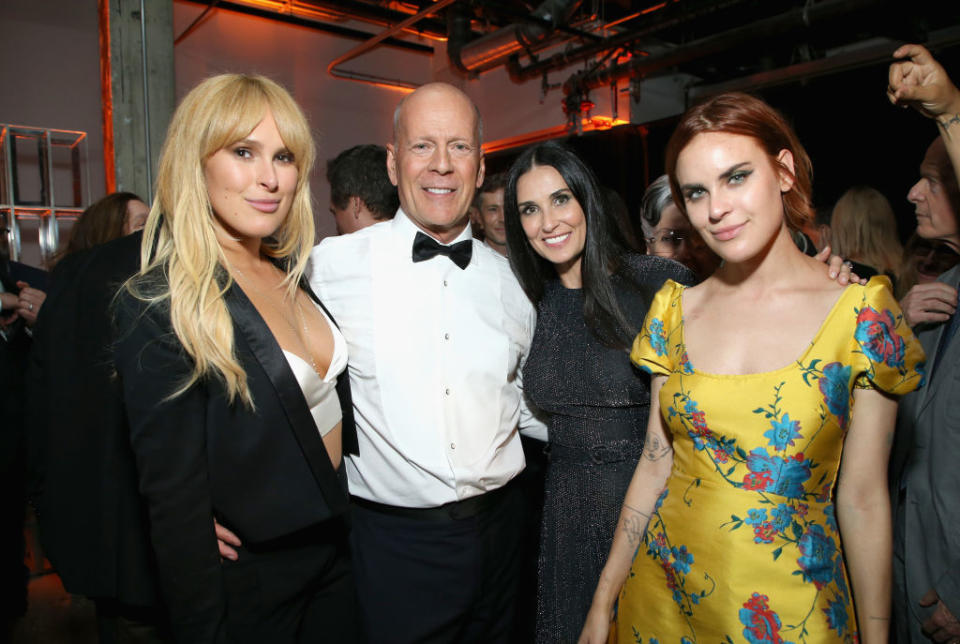 Bruce Willis and Demi Moore have remained on good terms, pictured here with their daughters in LA in July, 2018 (Getty Images)