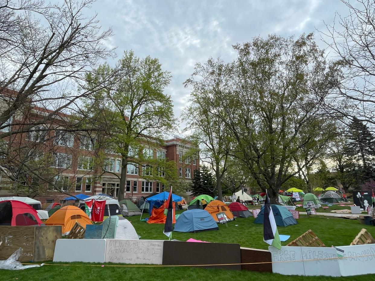 Tents are set up as people protest the Israel-Hamas war Thursday, May 2, 2024, at the University of Wisconsin-Milwaukee in Milwaukee, Wisconsin. Student protesters around the country have demanded colleges cut financial ties to Israel. The latest demonstrations show growing discontent over their schools’ responses to the Israeli-Hamas war.