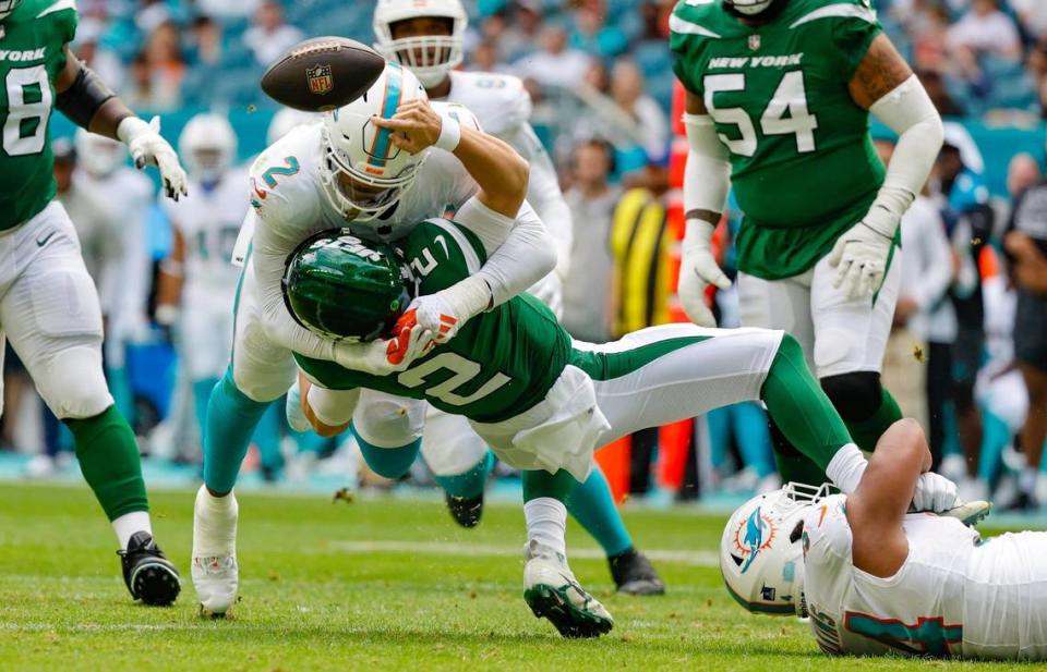 Miami Dolphins linebacker Bradley Chubb (2) sacks New York Jets quarterback Zach Wilson (2) in the first quarter at Hard Rock Stadium in Miami Gardens, Florida on Sunday, December 17, 2023.