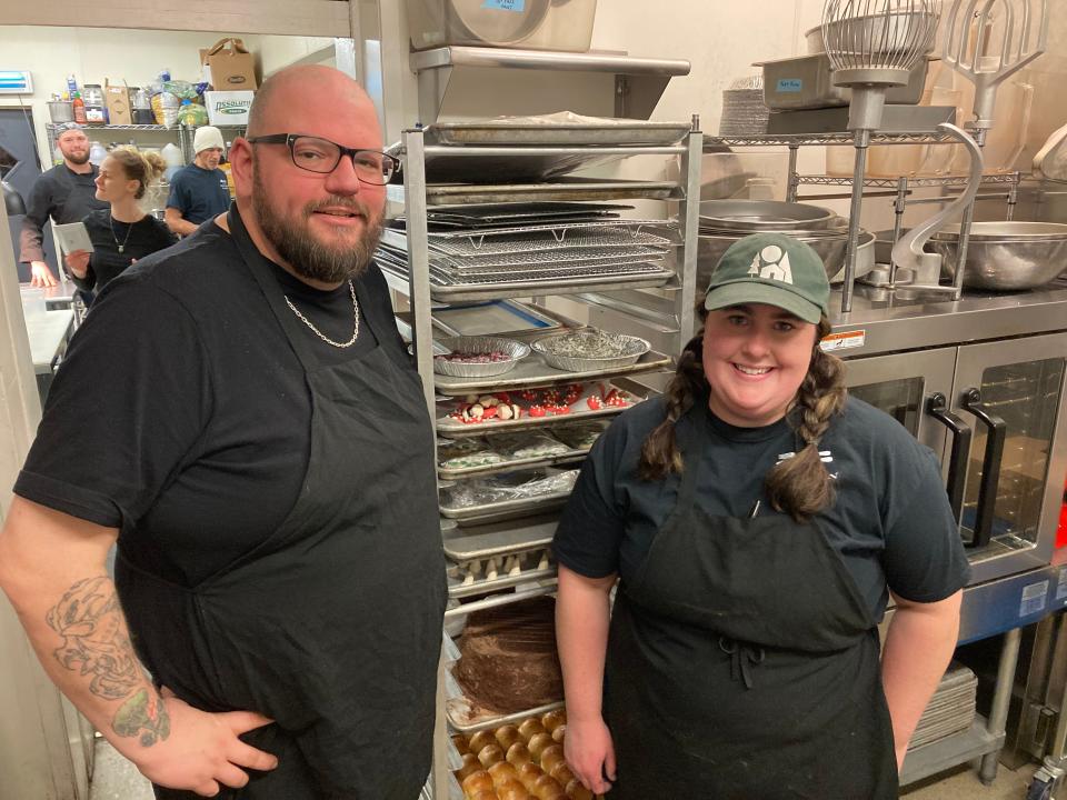 Craig Anthony and Samantha LaCroix stand Dec. 20, 2023 at their restaurant, The Kitchen Table in Richmond.