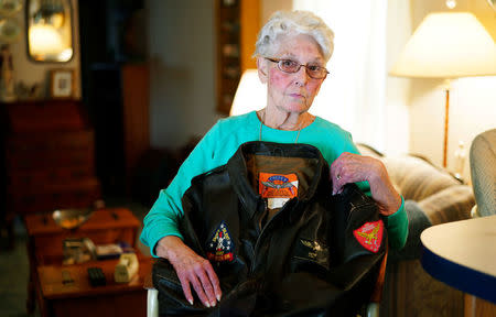 FILE PHOTO: Shirley Hollenback, wife of Gerald "'Cactus" Hollenback, whose husband's ashes were lost by Sunset Mesa Funeral Directors poses with his Marine Corps bomber jacket in her home in Montrose, Colorado, U.S., December 16, 2017. REUTERS/Rick Wilking