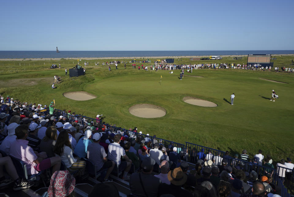 South Africa's Louis Oosthuizen putts on the 12th green during the third round of the British Open Golf Championship at Royal St George's golf course Sandwich, England, Saturday, July 17, 2021. (AP Photo)