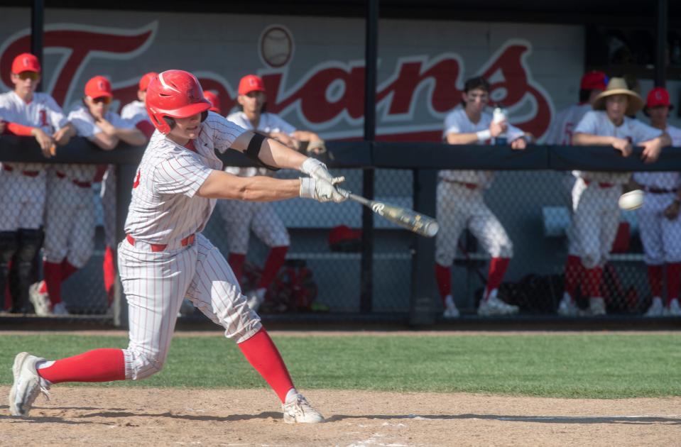Lincoln's Caleb Hendrick hits a single during a varsity baseball game against Tokay at Lincoln in Stockton on Wednesday, Apr.19, 2023.
