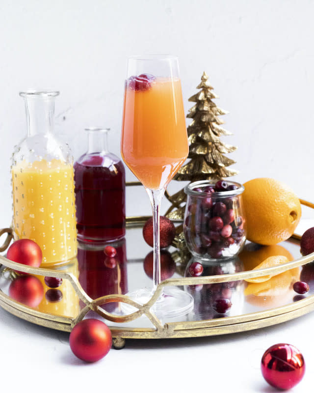 <p>Recipes From A Pantry</p><p>Two favorite Christmas flavors come together in a brand new way.</p><p><strong>Get the recipe: <a href="https://recipesfromapantry.com/cranberry-mimosa-cocktail/" rel="nofollow noopener" target="_blank" data-ylk="slk:Cranberry Orange Mimosas;elm:context_link;itc:0;sec:content-canvas" class="link ">Cranberry Orange Mimosas</a></strong></p>