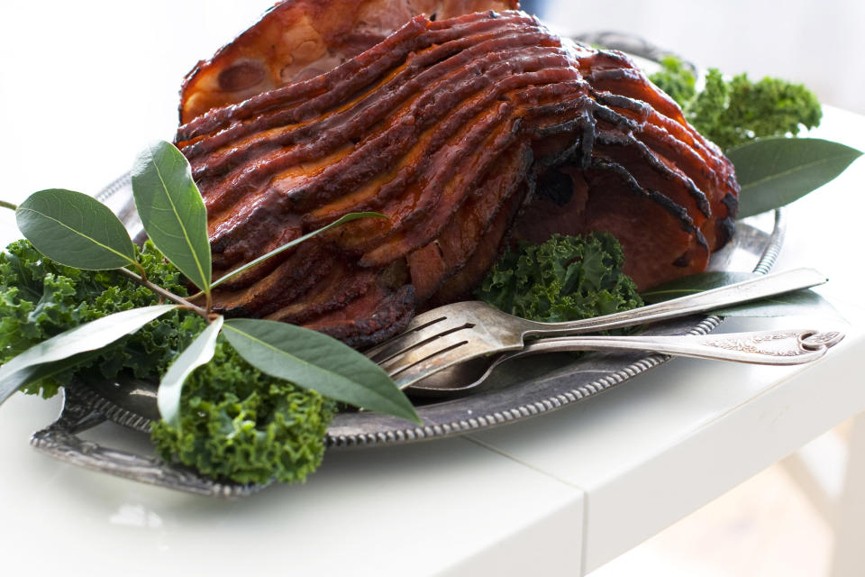 In this image taken on Dec. 3, 2012, peppadew glazed ham is shown on a serving platter in Concord, N.H. (AP Photo/Matthew Mead)