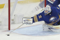 Buffalo Sabres goaltender Dustin Tokarski (31) stretches to make a save during the third period of an NHL hockey game against the Montreal Canadiens on Friday, Nov. 26, 2021, in Buffalo, N.Y. (AP Photo/Joshua Bessex)