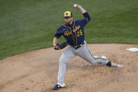 Milwaukee Brewers starting pitcher Brett Anderson delivers during the first inning of a baseball game against the Chicago Cubs Thursday, Aug. 13, 2020, in Chicago. (AP Photo/Jeff Haynes)