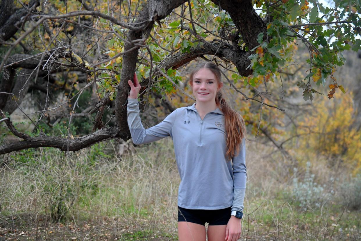 Oaks Christian School's Payton Godsey poses for a portrait at Cheeseboro Canyon Trail in Agoura Hills on Thursday, Dec. 15, 2022. The cross country star won a league title, CIF-SS title, state and national title during her junior season.