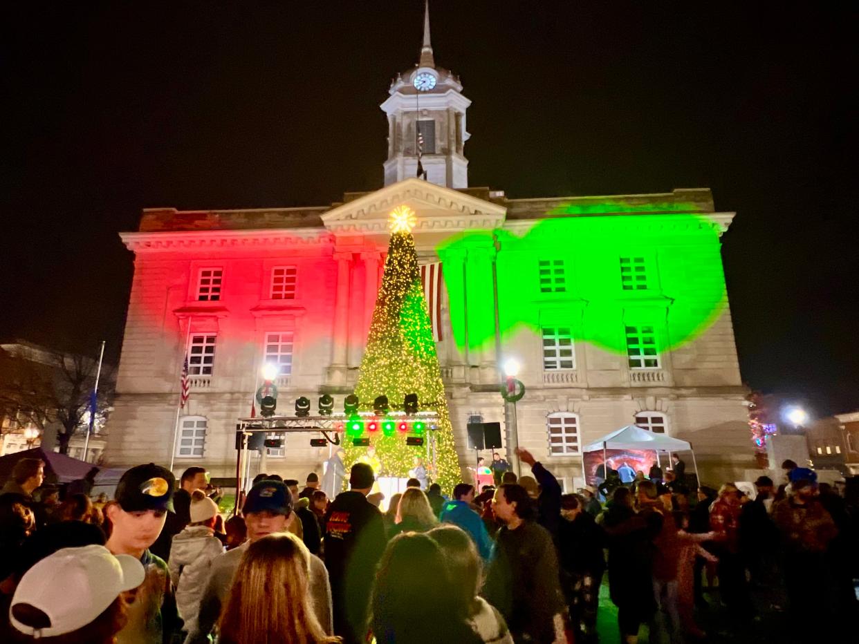 Downtown Columbia is illuminated by its 40-foot Christmas Tree during the 37th annual Columbia Main Street Christmas Parade & Tree Lighting.