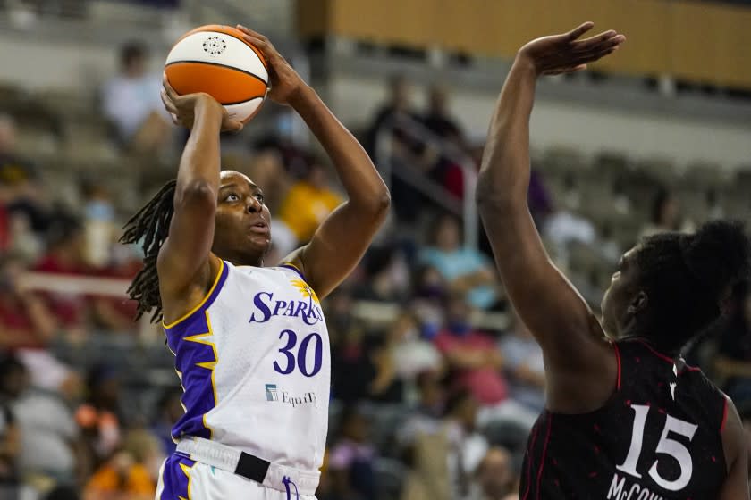 Los Angeles Sparks forward Nneka Ogwumike (30) shoots over Indiana Fever forward Teaira McCowan.