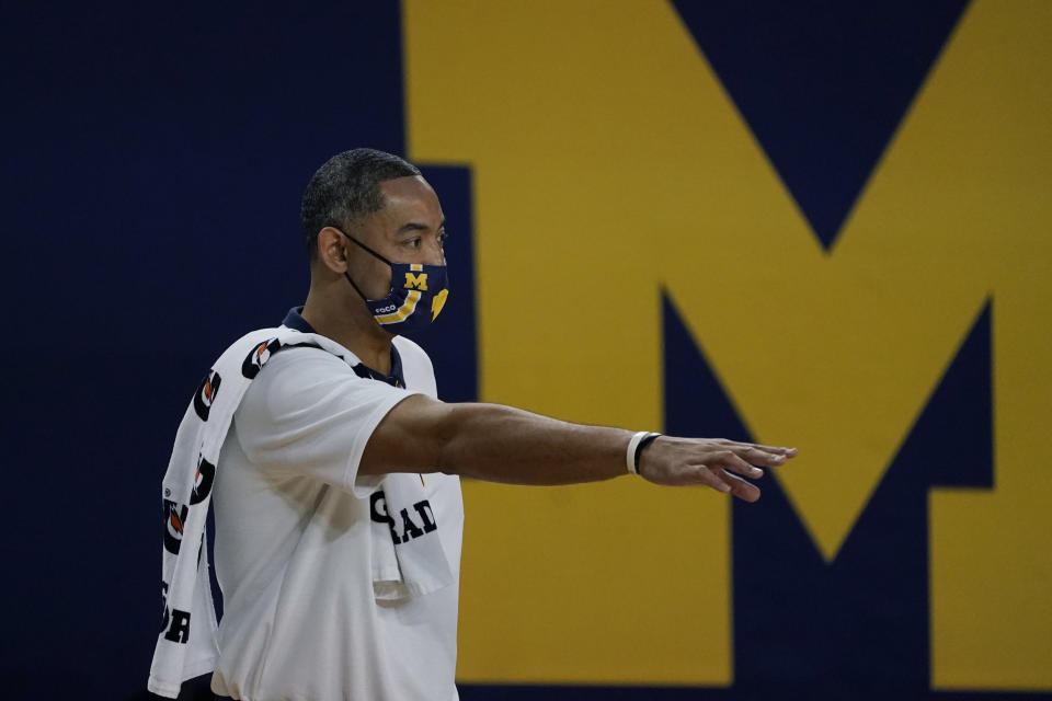 Michigan head coach Juwan Howard gestures from the sideline during the first half of an NCAA college basketball game against Bowling Green, Wednesday, Nov. 25, 2020, in Ann Arbor, Mich. (AP Photo/Carlos Osorio)