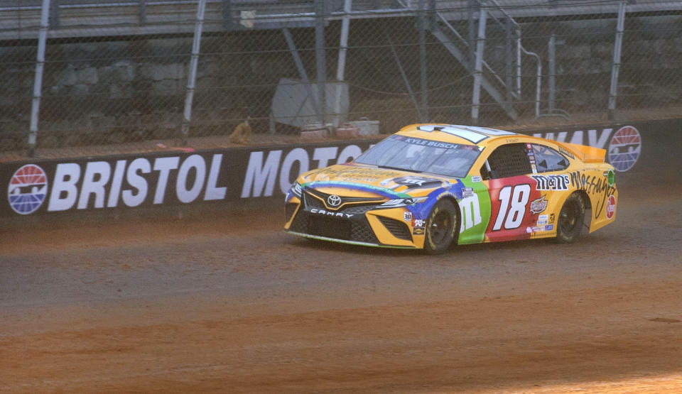 FILE - Kyle Busch drives along the dirt track during NASCAR Cup Series practice, Friday, March 26, 2021, at Bristol Motor Speedway in Bristol, Tenn. Bristol Motor Speedway will ditch the dirt track concept the Tennessee short track has used the last three years and run both of its 2024 NASCAR weekends on the concrete surface. (David Crigger/Bristol Herald Courier via AP, File)