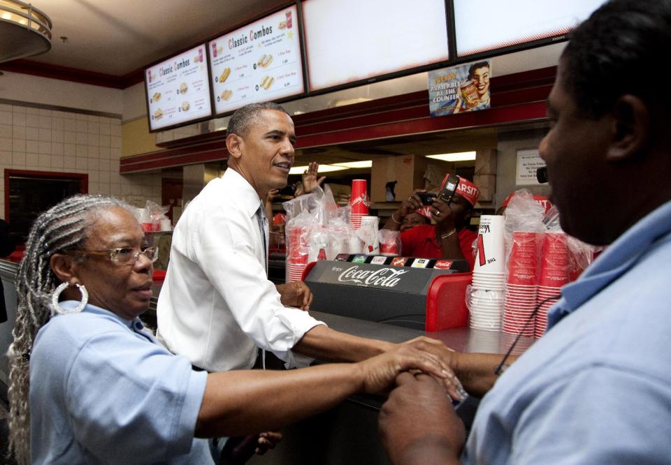 President Barack Obama stops at The Varsity restaurant, Tuesday, June 26, 2012, in Atlanta. (AP Photo/Carolyn Kaster)