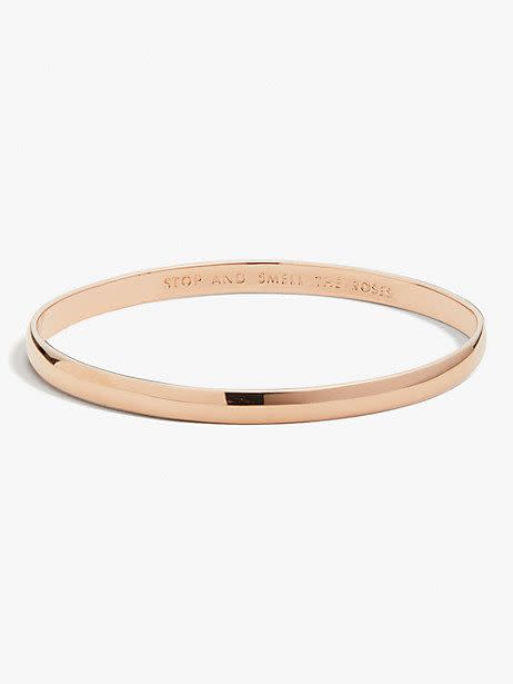 <p><a href="https://go.redirectingat.com?id=74968X1596630&url=https%3A%2F%2Fwww.katespade.com%2Fproducts%2Fstop-and-smell-the-roses-idiom-bangle%2FWBRU9166.html&sref=https%3A%2F%2Fwww.thepioneerwoman.com%2Fhome-lifestyle%2Fg36078947%2Fgraduation-gifts-for-girls%2F" rel="nofollow noopener" target="_blank" data-ylk="slk:Shop Now;elm:context_link;itc:0;sec:content-canvas" class="link ">Shop Now</a></p><p>'Stop and Smell the Roses' Bangle</p><p>katespade.com</p><p>$48.00</p><span class="copyright">Kate Spade</span>