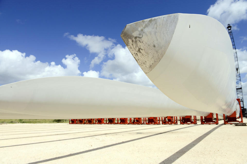 FILE - This July 29, 2016 file photo shows wind turbine blades at the Port of Brownsville, Texas. On Friday, June 25, 2021, the Associated Press reported on stories circulating online incorrectly claiming a photo shows a wind turbine that melted in the Texas heat. (Jason Hoekema/The Brownsville Herald via AP)