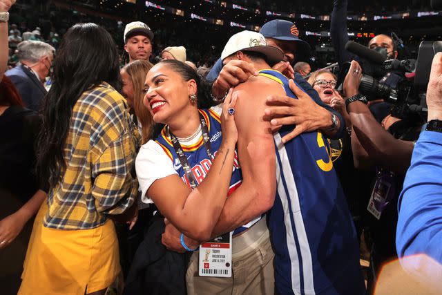<p>Nathaniel S. Butler/NBAE via Getty</p> (R-L) Stephen Curry of the Golden State Warriors celebrates with Ayesha Curry after Game Six of the 2022 NBA Finals on June 16, 2022 at TD Garden in Boston, Massachusetts.