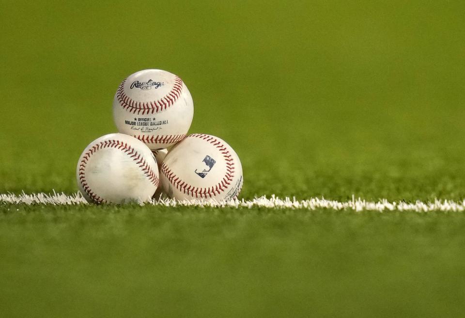 Minor league players in the Mets and Phillies farm systems wore teal wristbands to protest unfair pay.