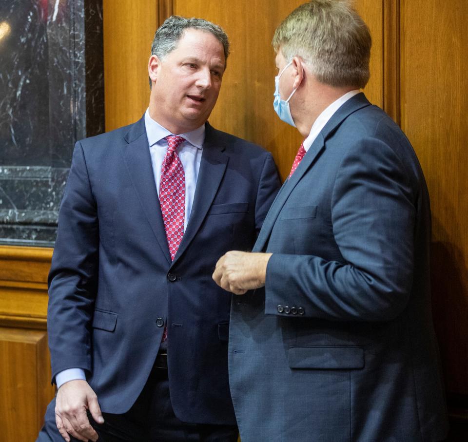 Indiana House Speaker Todd Huston (left) chats with Phil GiaQuinta on Organization Day at Indiana Statehouse, Indianapolis, Tuesday, Nov. 16, 2021.