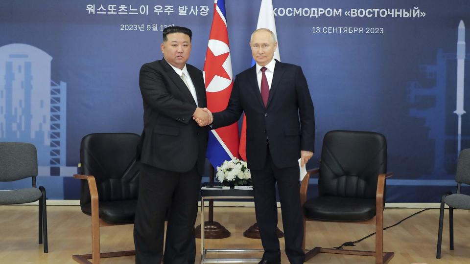 FILE - In this photo provided by the North Korean government, North Korean leader Kim Jong Un, left, and Russian President Vladimir Putin shake hands before their talk at the Vostochny cosmodrome outside the city of Tsiolkovsky, about 200 kilometers (125 miles) from the city of Blagoveshchensk in the far eastern Amur region, Russia, Wednesday, Sept. 13, 2023. Independent journalists were not given access to cover the event depicted in this image distributed by the North Korean government. The content of this image is as provided and cannot be independently verified. Korean language watermark on image as provided by source reads: 