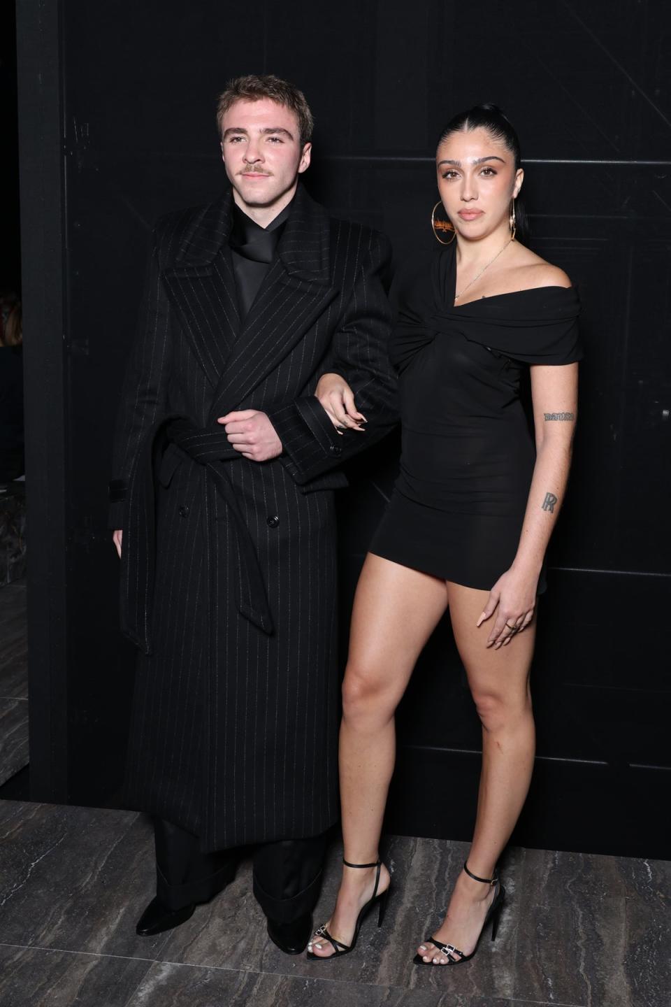 Madonna’s children, Rocco Ritchie and Lourdes Leon, are spotted at Saint Laurent’s show (Pascal Le Segretain / Getty Images)