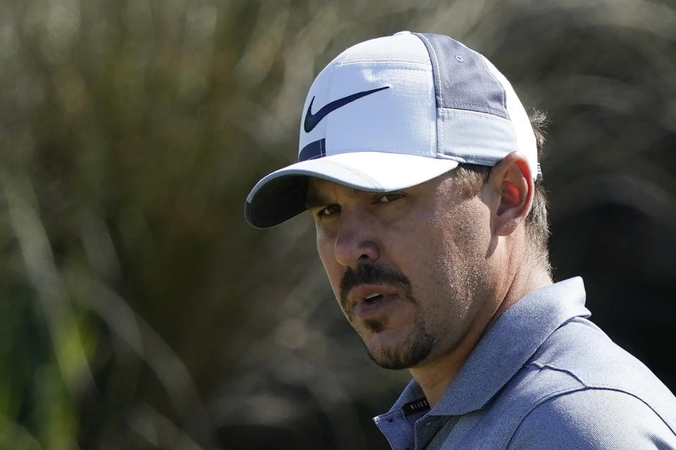 FILE - Brooks Koepka is shown after a birdie on the 13th hole during the first round of the PGA Championship golf tournament on the Ocean Course in Kiawah Island, S.C., in this Thursday, May 20, 2021, file photo. Brooks Koepka is back on tour, playing the inaugural Palmetto Championship for his first tournament since the PGA Championship and since his apparent fued with Bryson DeChambeau moved to a new level. (AP Photo/Matt York, File)