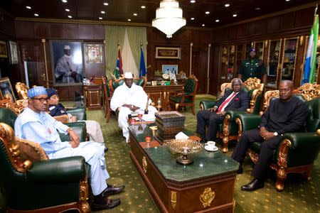 Gambian President Yahya Jammeh meets with with the West Africa head of delegation during the election crisis mediation at the presidential palace Banjul, Gambia December 13, 2016 REUTERS/Stringer