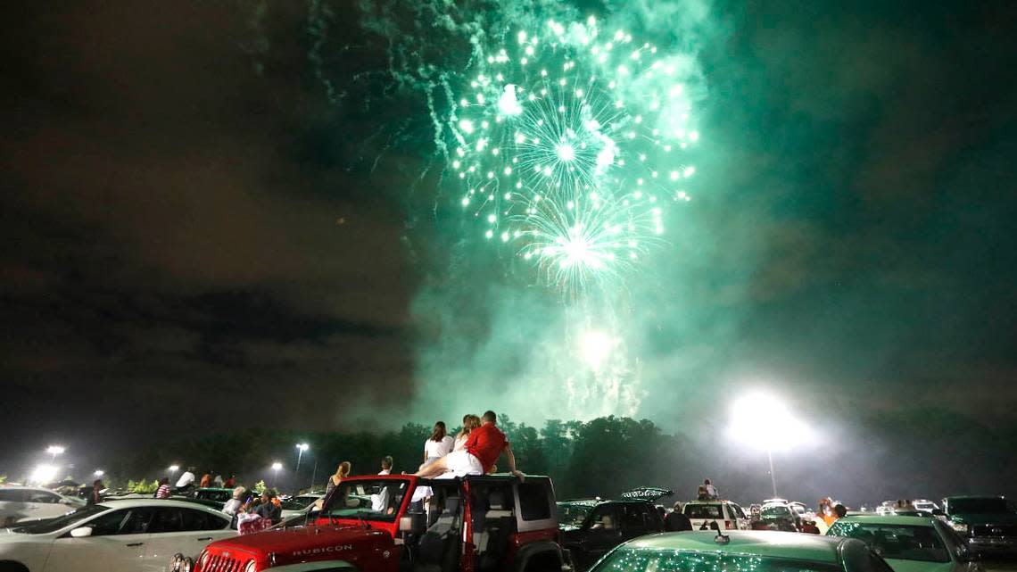 This is a fireworks display near Carter-Finley Stadium and PNC Arena in Raleigh, N.C., Wednesday, July 4, 2018.