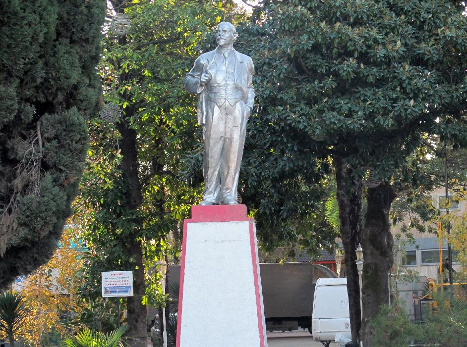 This Dec. 9, 2012 photo shows a statue of the late Russian leader Vladimir Lenin in a casual posture in a park in the resort city of Sochi, Russia. Sochi is the location of the 2014 Winter Olympics, which will be held from Feb. 7-23. (AP Photo/Jim Heintz)