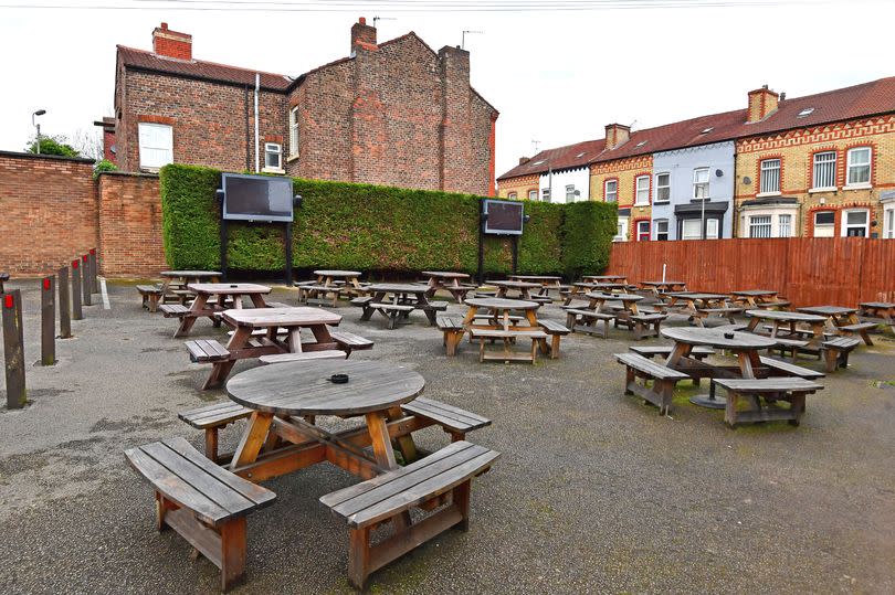 The beer garden and outside TVs at the Windsor