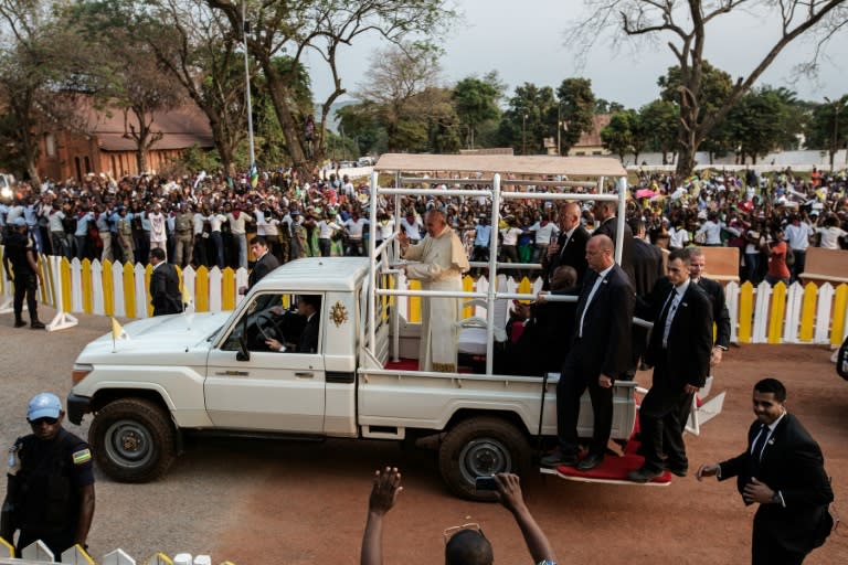 Huge crowds greet Pope Francis as he arrives at the Notre Dame Cathedral on November 29, 2015 in Bangui, Central African Republic