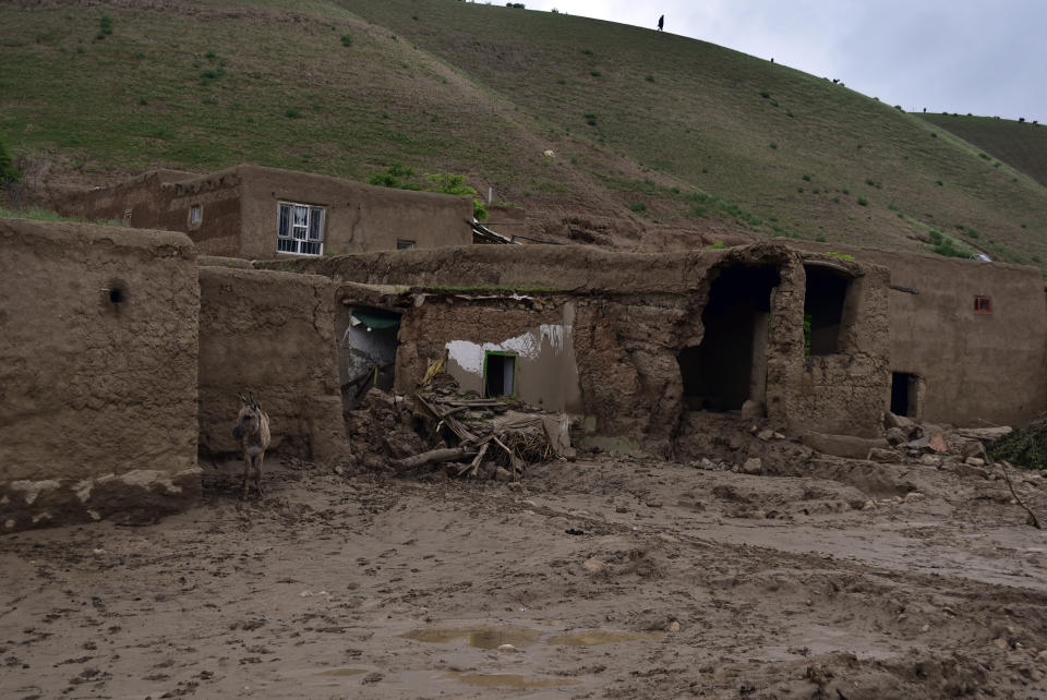 A damaged house is seen after heavy flooding in Baghlan province in northern Afghanistan Saturday, May 11, 2024. Flash floods from seasonal rains in Baghlan province in northern Afghanistan killed dozens of people on Friday, a Taliban official said. (AP Photo/Mehrab Ibrahimi)