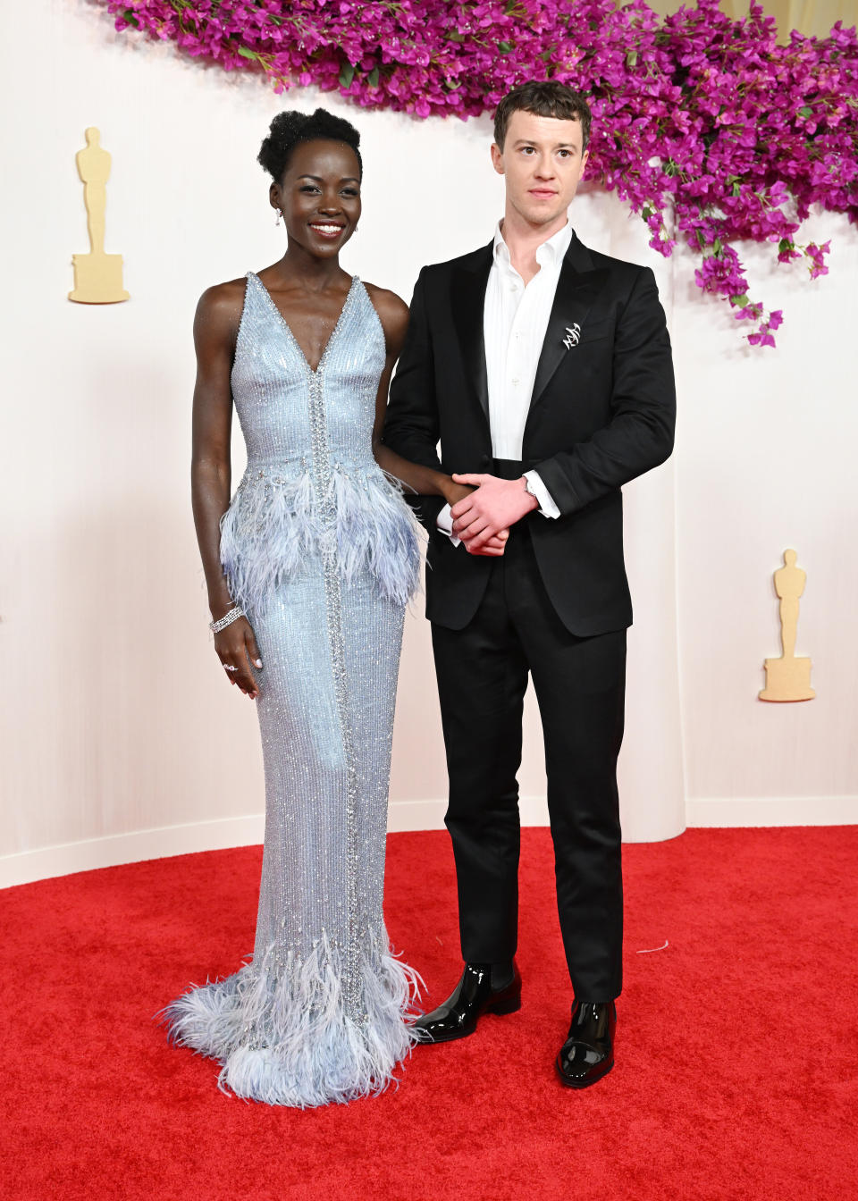 Lupita Nyong'o and Joseph Quinn at the 96th Annual Oscars held at at the Ovation Hollywood on March 10, 2024 in Los Angeles, California. (Photo by Gilbert Flores/Variety via Getty Images)