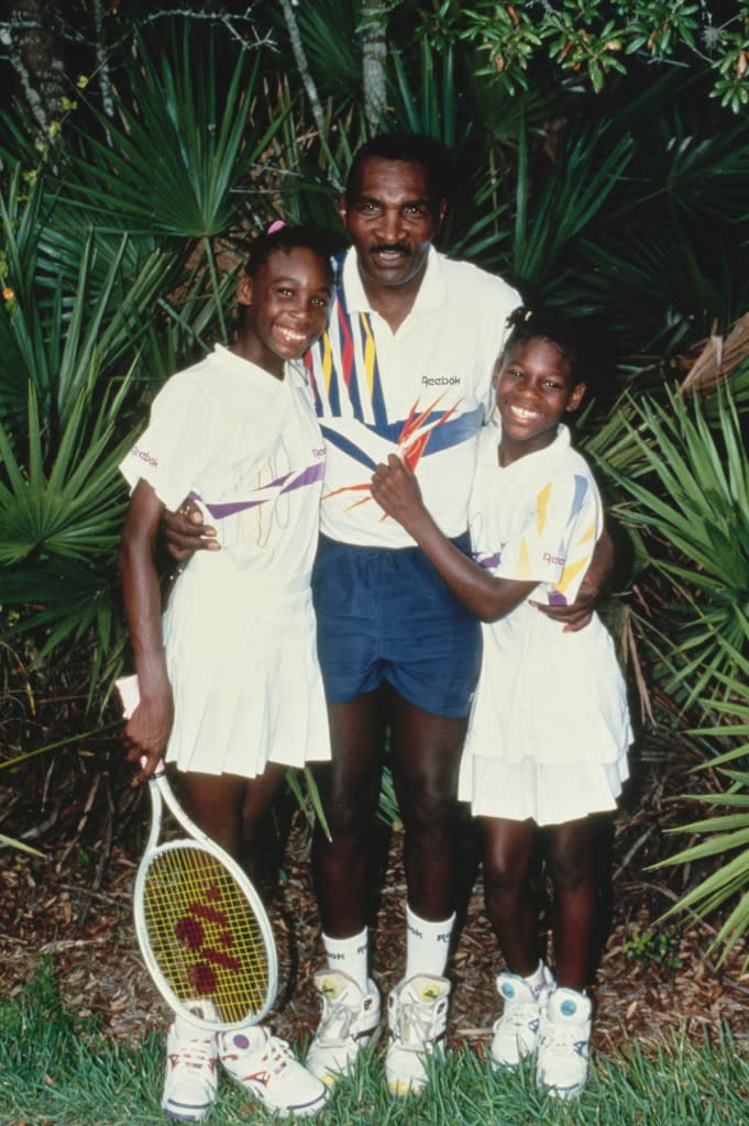 Richard Williams with his tennis-star daughters. Getty Images