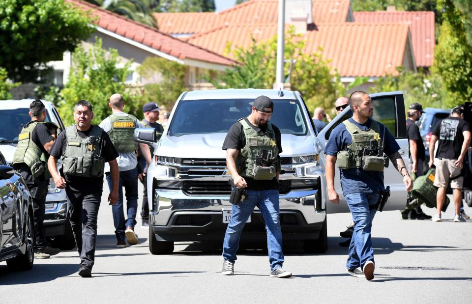 Orange County Sheriff's detectives search the Camarillo house of John Snowling on Thursday, Aug. 24, 2023.