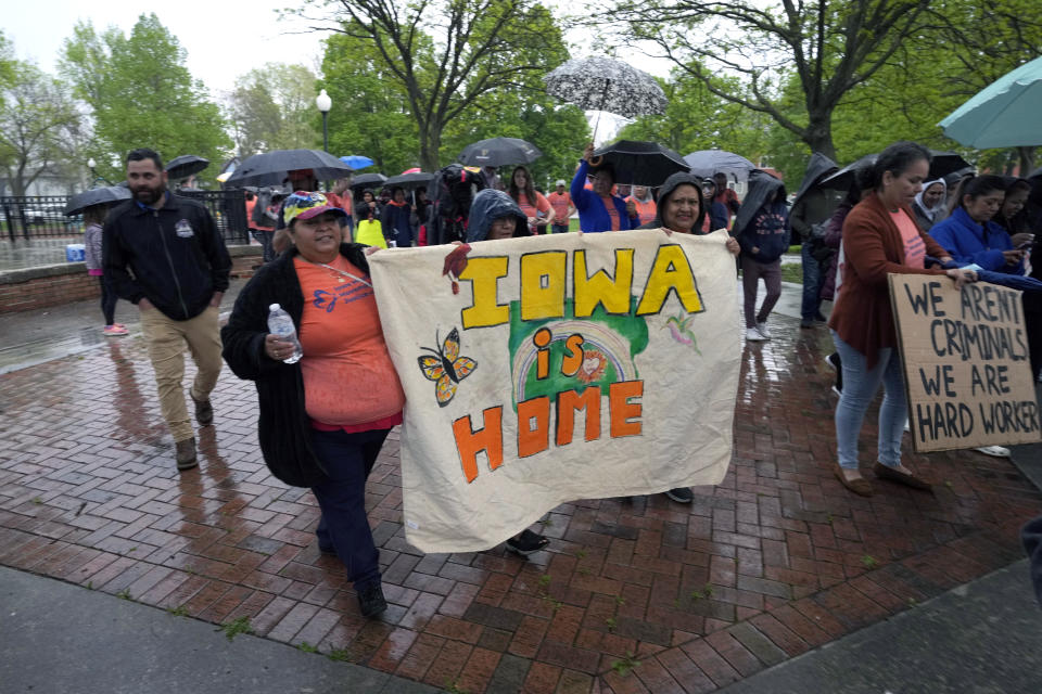 FILE - People march during an Iowa Movement for Migrant Justice rally and march, Wednesday, May 1, 2024, in Des Moines, Iowa. (AP Photo/Charlie Neibergall, File)
